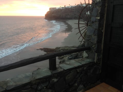 On the beach, sun loungers, beach towels