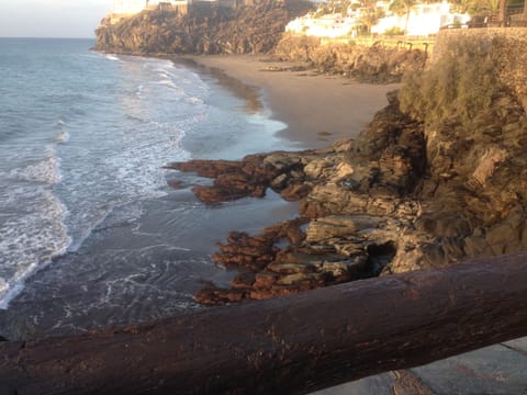 On the beach, sun loungers, beach towels