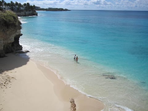 On the beach, sun loungers, beach towels