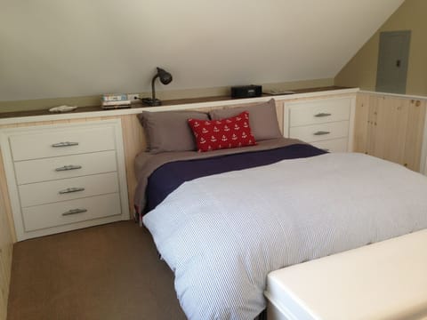 Queen bed and built in dressers