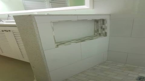 Combined shower/tub, hair dryer, towels, soap