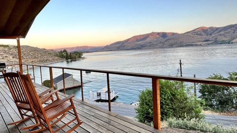 Enjoy spectacular views of beautiful Lake Chelan and amazing sunset pictures from this beautiful home!