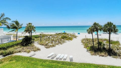 On the beach, sun loungers, beach towels