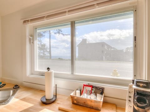 View from the Kitchen Window.  Can see the Ocean across Hwy 101