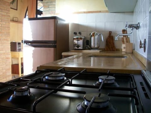 The kitchen (it has a table with 4 chairs)