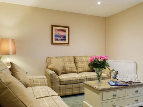 Relaxing living and dining room | The Lodge Cottage, Methven, near Perth