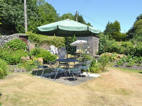 Well-maintained garden with outdoor furniture | Bandrake Barn, Oxen Park, near Ulverston