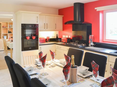 Large kitchen/diner with access to the utility room | Hawthorne House, Amble, near Warkworth
