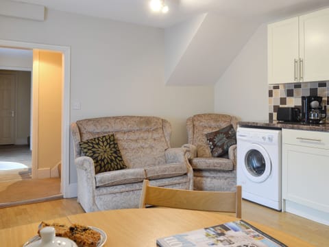 Seating area within kitchen and dining room | Paddock Cottage - Trimstone Manor Cottages, Trimstone, near Woolacombe