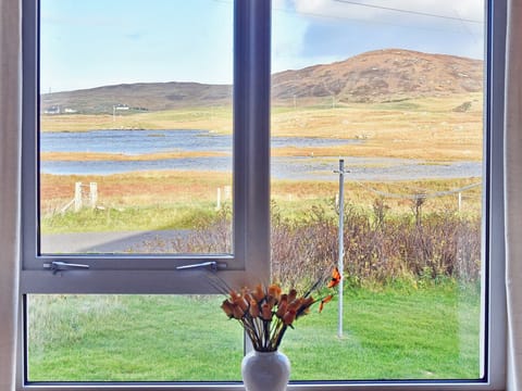 Wonderful loch views from the back bedroom | Padraig&rsquo;s Cottage, Howbeg (Tobha Beag), Isle of South Uist