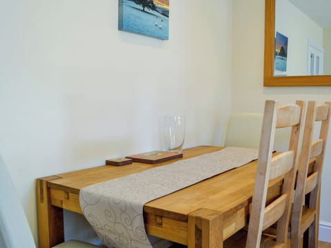 Modest dining area | Ghillie Cottage, Cockermouth