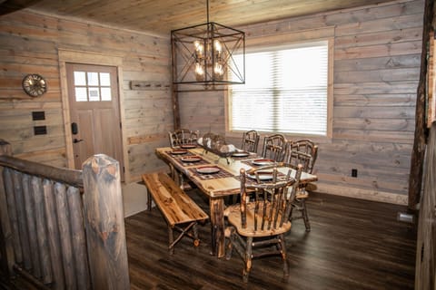 Front entrance into cozy dining space. Seats 8-9 people