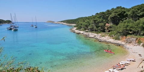 Beach nearby, sun loungers