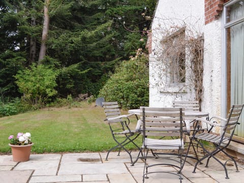 Paved patio area with outdoor furniture | Lairds Cast, Inchmarlo, Banchory