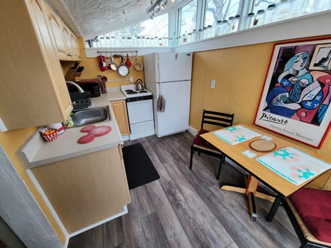 Full kitchen with stove, fridge, microwave, coffee maker, etc.