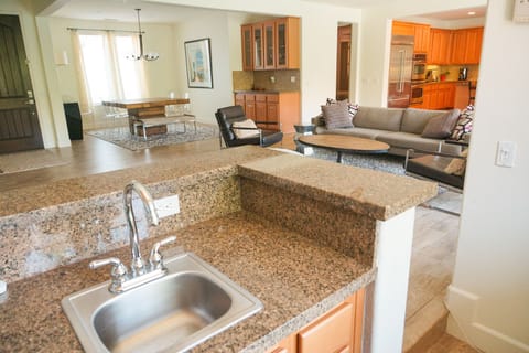 View from Sunken Wetbar, of Dining Area, Great Room and Kitchen.