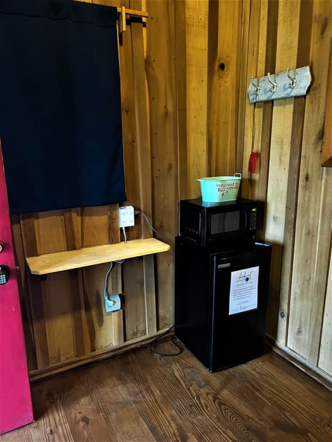 Dorm fridge and microwave. Plenty of outlets to charge your devices