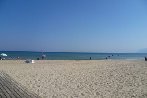 On the beach, sun loungers