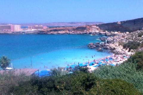 On the beach, sun loungers