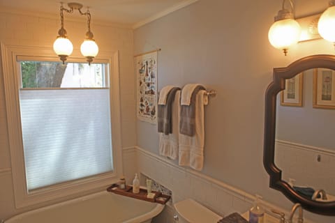 Combined shower/tub, hair dryer, towels, soap