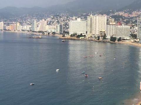 On the beach, sun loungers, beach towels