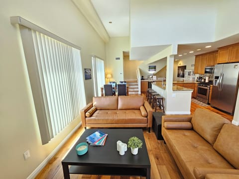 Sofas can comfortably seat 5 adults total. Can hold up to 600lbs max each.