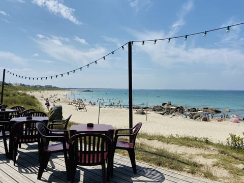 On the beach, sun loungers