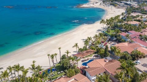 On the beach, sun loungers, beach towels