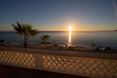 On the beach, sun loungers, beach towels