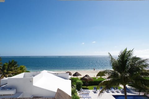 On the beach, sun loungers, beach towels