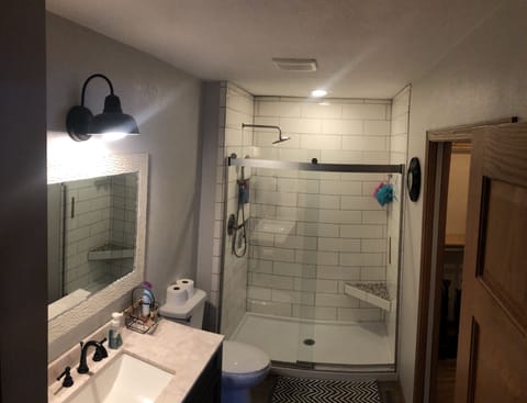 Combined shower/tub, hair dryer, towels, soap