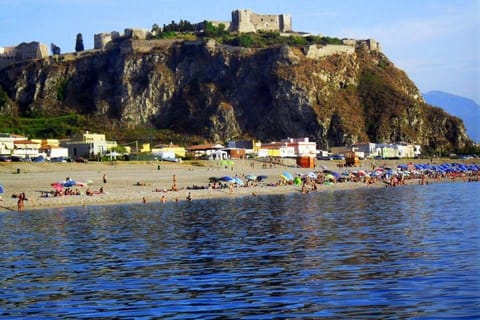 On the beach, sun loungers, beach towels