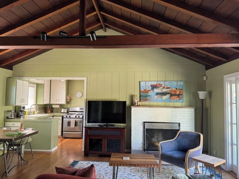 Vaulted ceilings create a beautiful space for the dining and living areas