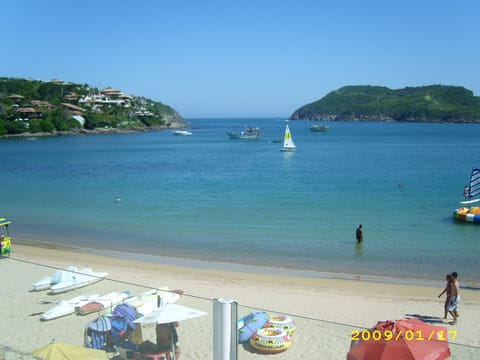 On the beach, sun loungers, beach towels