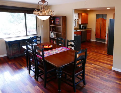 The dining room and the kitchen.