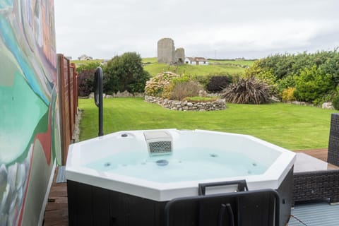 Hardwood deck with private hot tub overlooking a 500 yr old castle.