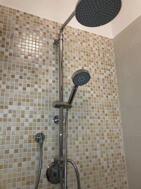 Shower, jetted tub, hair dryer, bidet