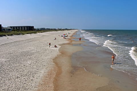 On the beach, sun loungers, beach towels