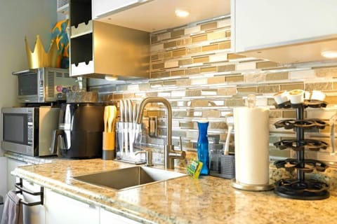 Mini kitchen with all the appliance in the Studio