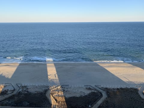 On the beach, sun loungers, beach towels