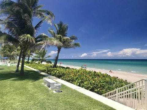 On the beach, sun loungers, beach towels