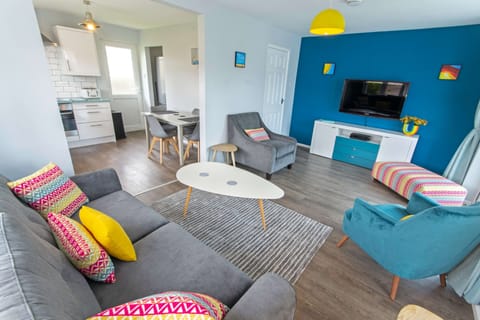 Comfortable lounge with hi tech tv and netflix