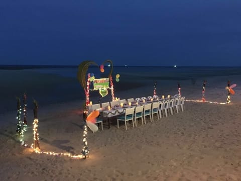 On the beach, sun loungers, beach towels