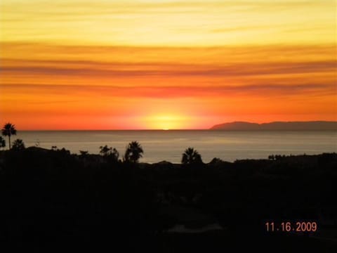 Sunset and Catalina Island view from Master Bedroom Balcony .