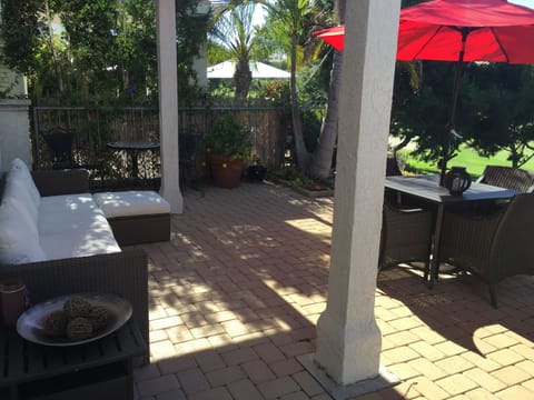 Extra sitting/Lounge area (left side) in the back yard.