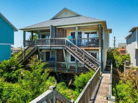 Enjoy ocean front views and your own private beach access