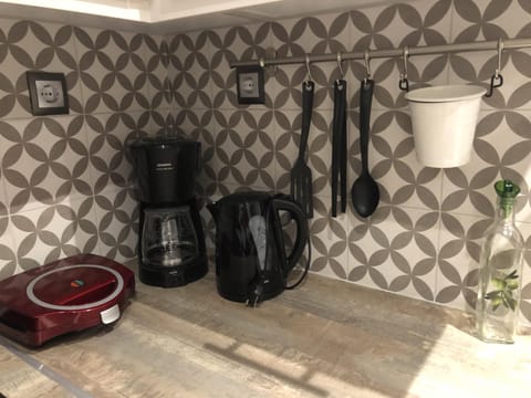 Microwave, coffee/tea maker, cookware/dishes/utensils