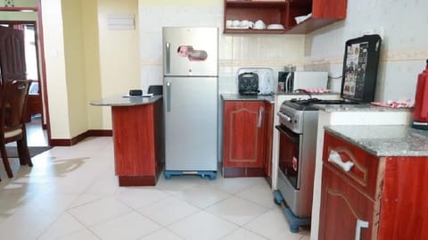 Fridge, coffee/tea maker, electric kettle, paper towels