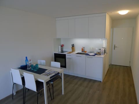 Room, Furniture, Floor, Property, Interior Design, Building, Kitchen, House, Table, Wood Flooring