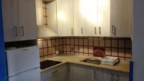 Fridge, stovetop, cookware/dishes/utensils